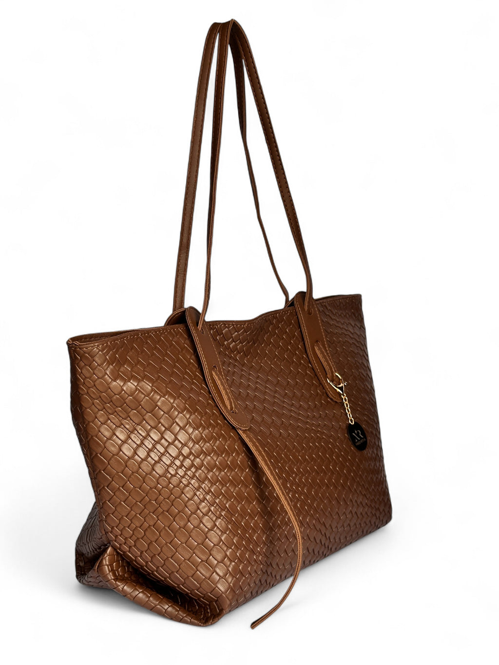 Woven faux leather tote bag in rich cognac brown. Wide shoulder handles, structured shape